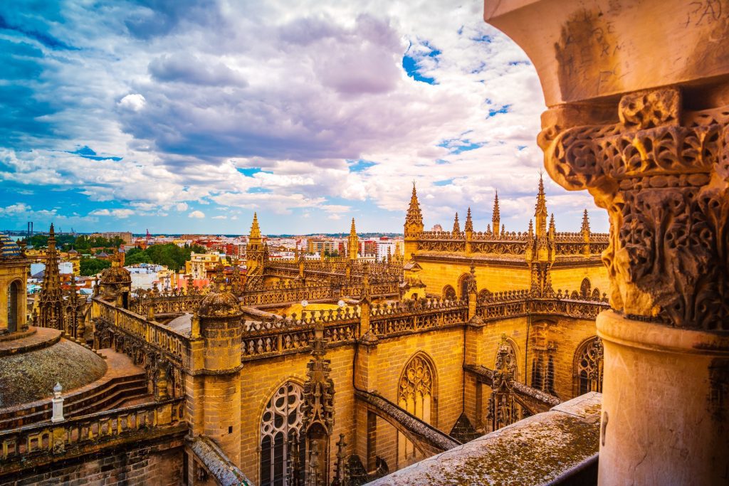 Spain Tours for Seniors / Aerial view of Seville city and Cathedral of Saint Mary of the See in Seville, Andalusia, Spain, Europe