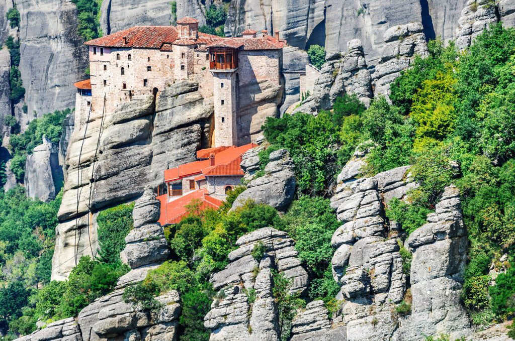 Meteora, Greece. Mountain scenery with Meteora rocks and Roussanou Monastery, landscape place of monasteries on the rock, orthodox religious greek landmark in Thessaly. (cge2010)