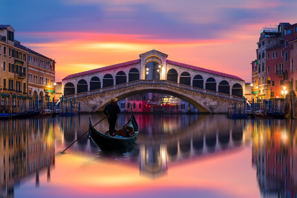 Escorted Tours Italy / Gondola Near Rialto Bridge in Venice, Italy